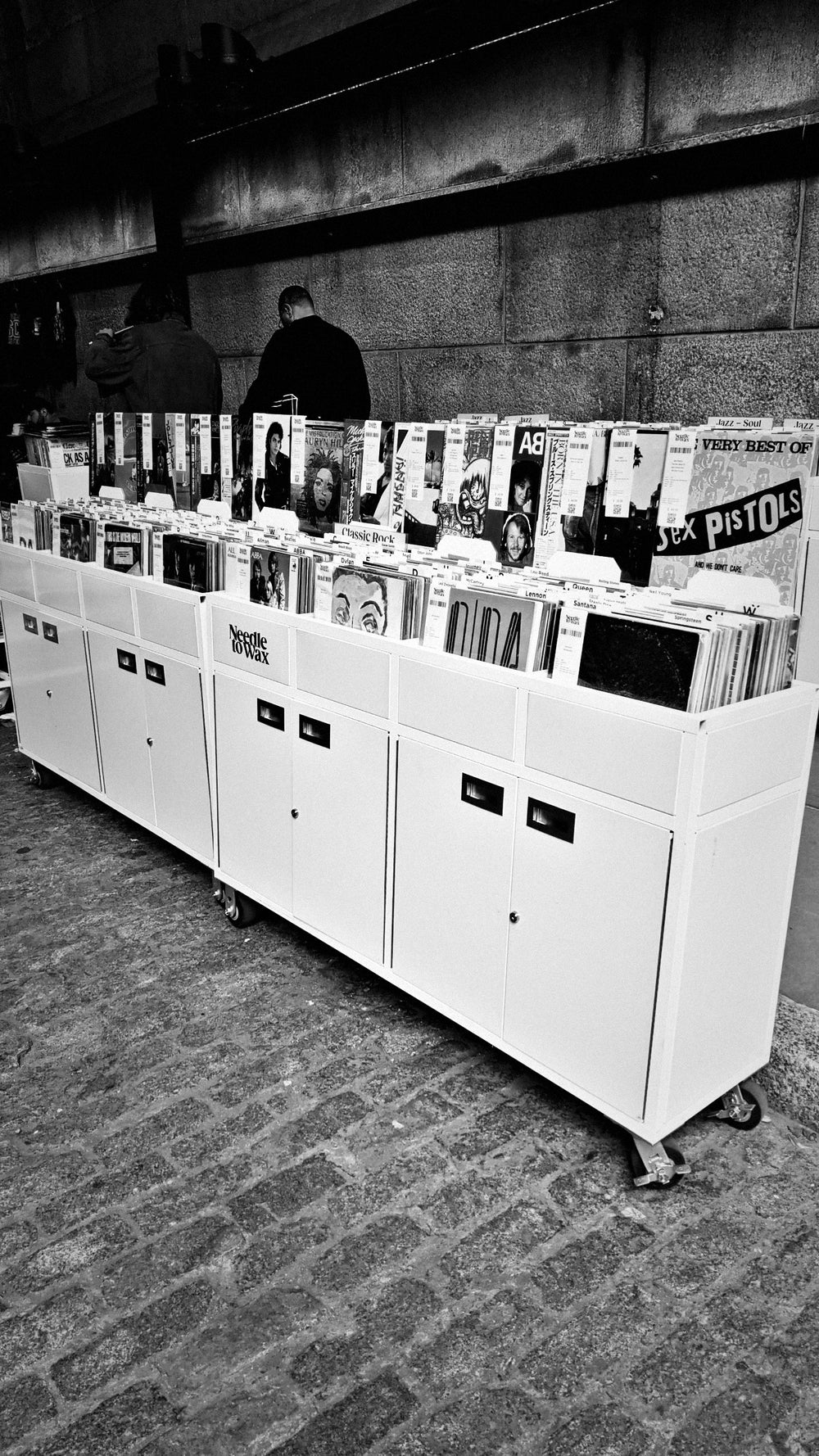 Needle to Wax record crates on the cobblestones in Dumbo